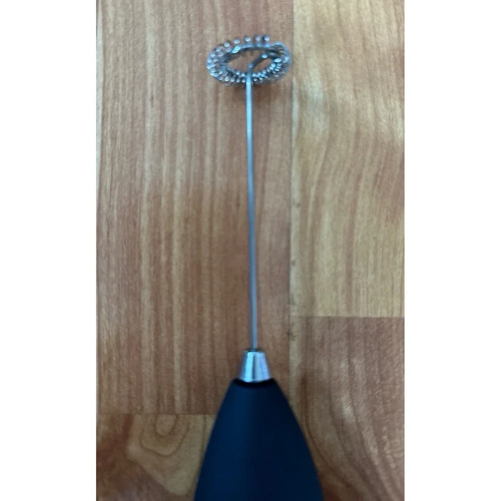 Orgain branded handheld electric mixer‎ designed for mixing drinks